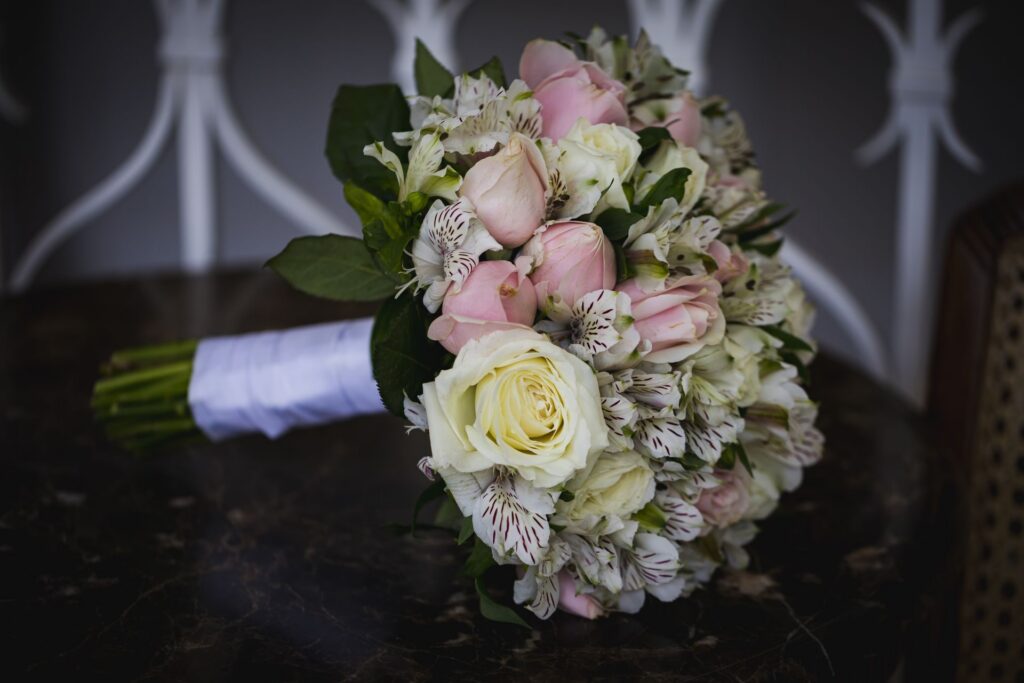 Bridal bouquet of pink and white roses with alstroemeria